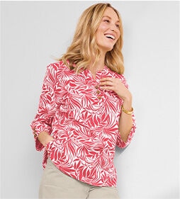 model wearing Captiva Y-Neck Stenciled Palms Popover