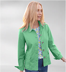 model smiling wearing Dennisport Anywhere Jacket