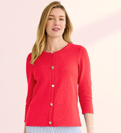 model wearing bright red cardigan