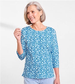 model wearing a Prima Cotton Stenciled Floral Tee