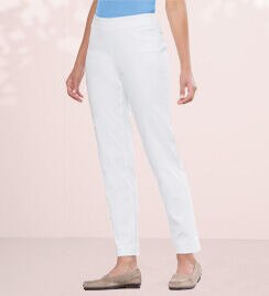model wearing white pants and light brown shoes