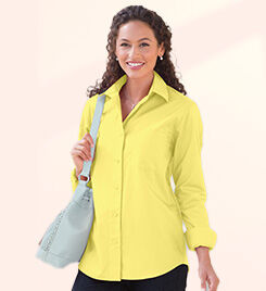 smiling model wearing a yellow shirt