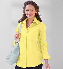 model smiling wearing Foxcroft Classic Fit Solid Shirt