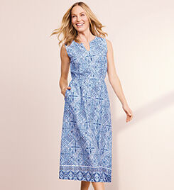 model wearing a blue and white patterned dress